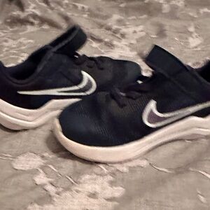Nike Kids Navy Blue sneakers. Gently worn. Great condition.